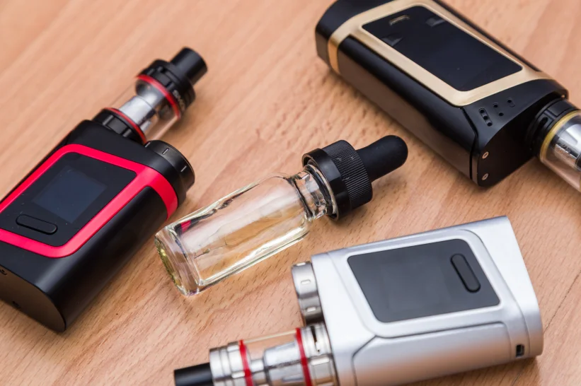 a group of electronic THCA vapes on a table